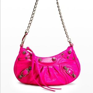 Brand new hot pink Balenciaga mini Le Cagole bag.